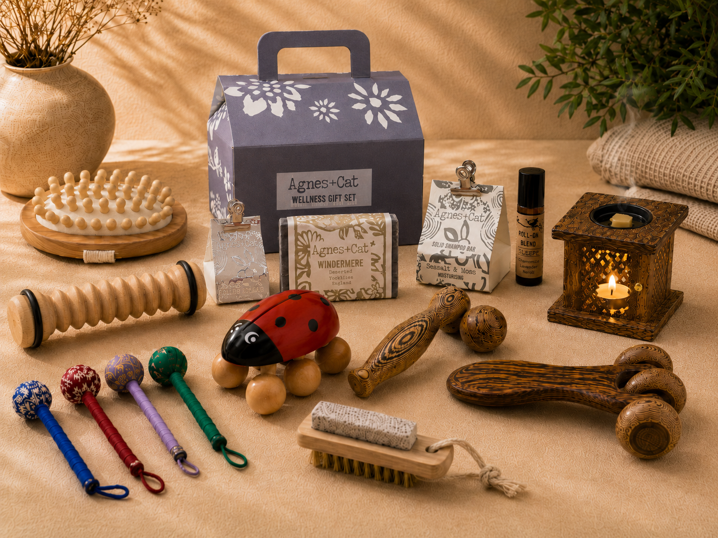 Premium WoodenLandia wellness collection with Agnes+Cat gift set, wooden massage rollers, ladybug massager, aroma burner and self-care tools