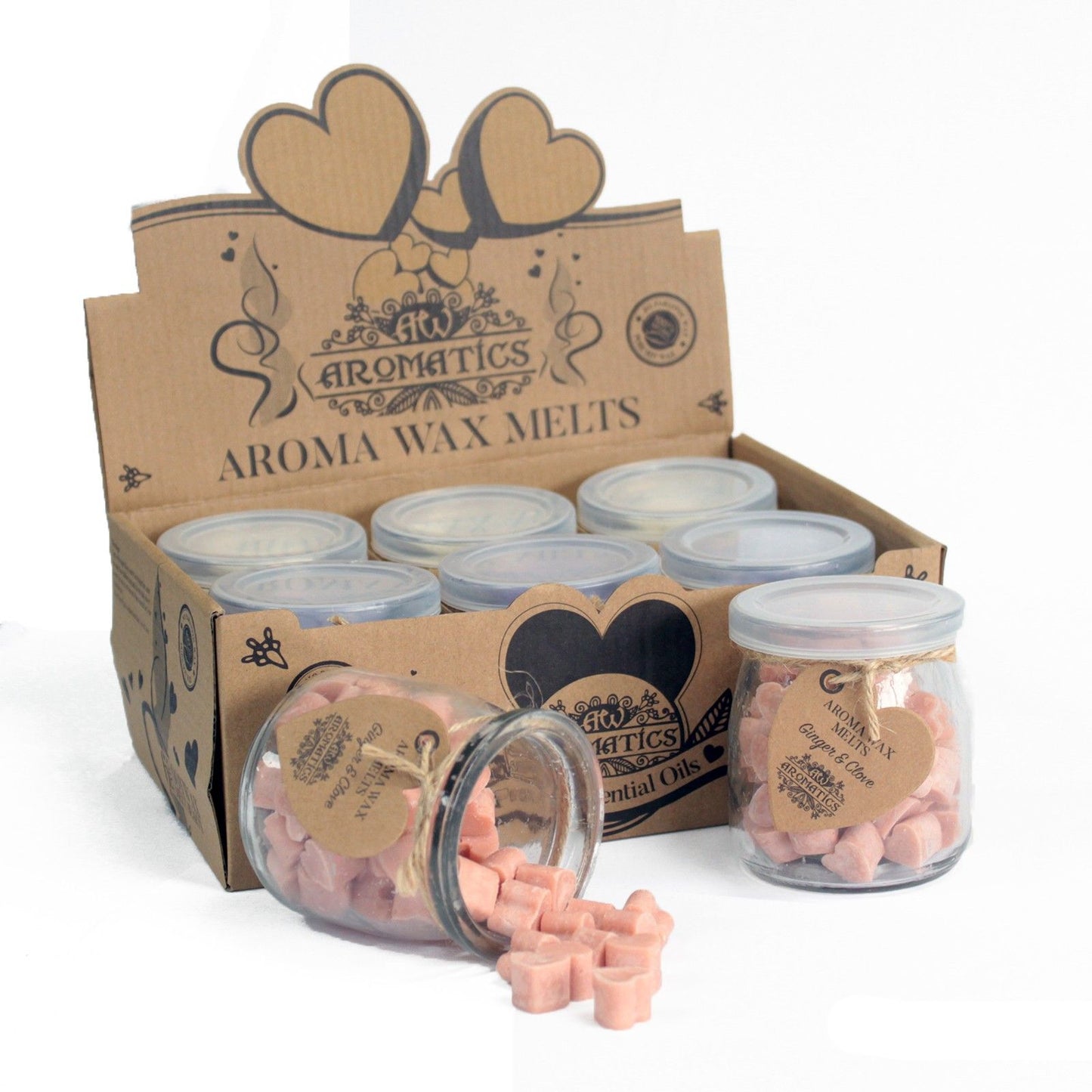 Ginger and clove aroma wax melts in glass jar with soy wax hearts