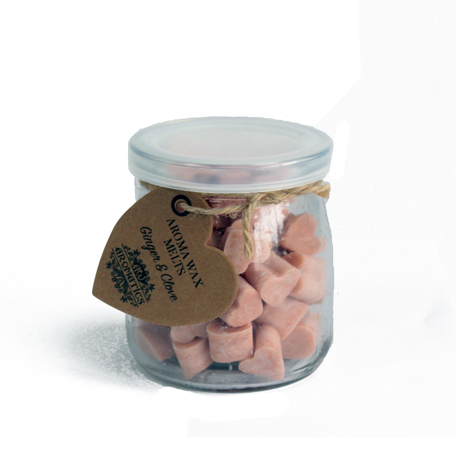 Ginger and clove aroma wax melts in glass jar with soy wax hearts