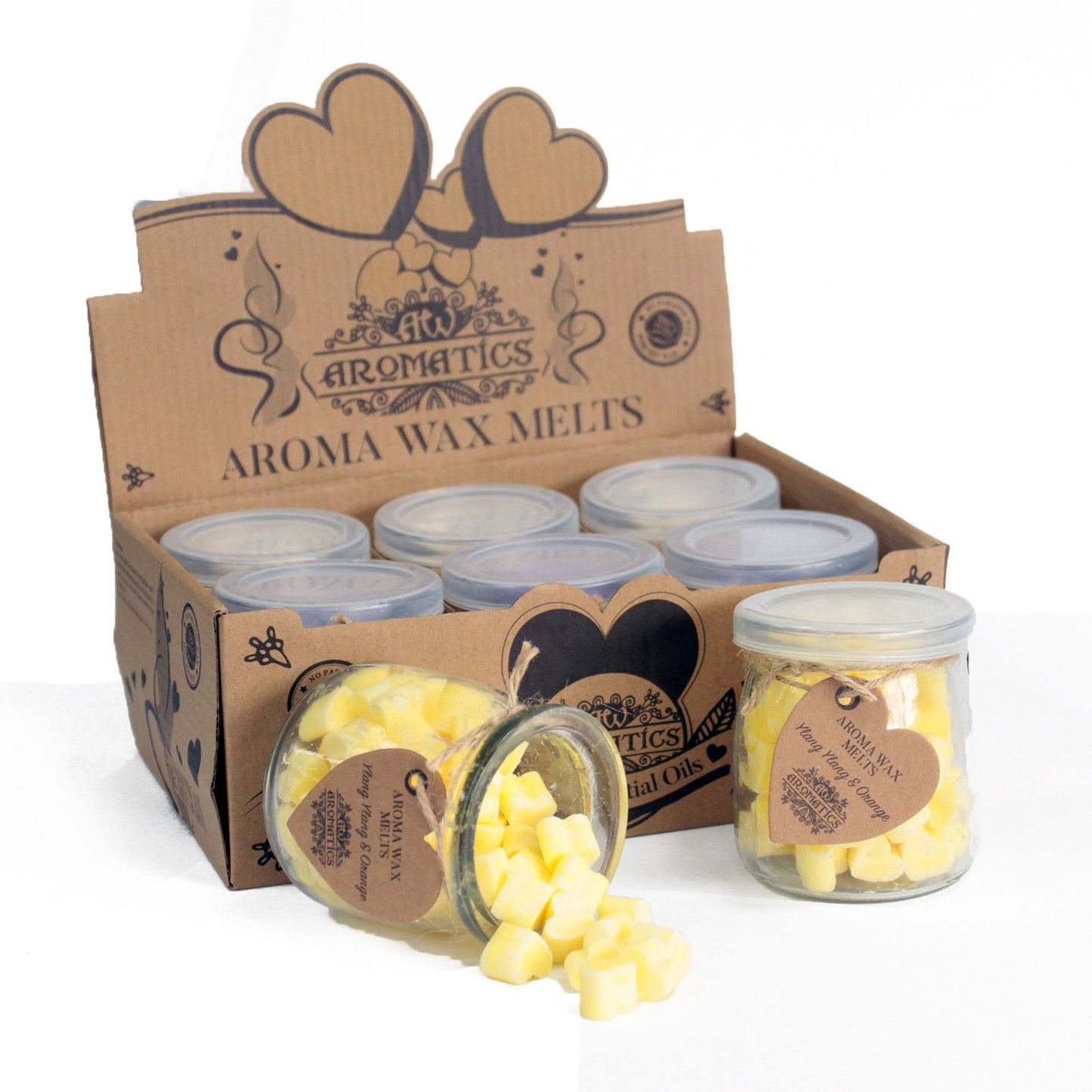 Ylang ylang and orange aroma wax melts in glass jar with soy wax hearts