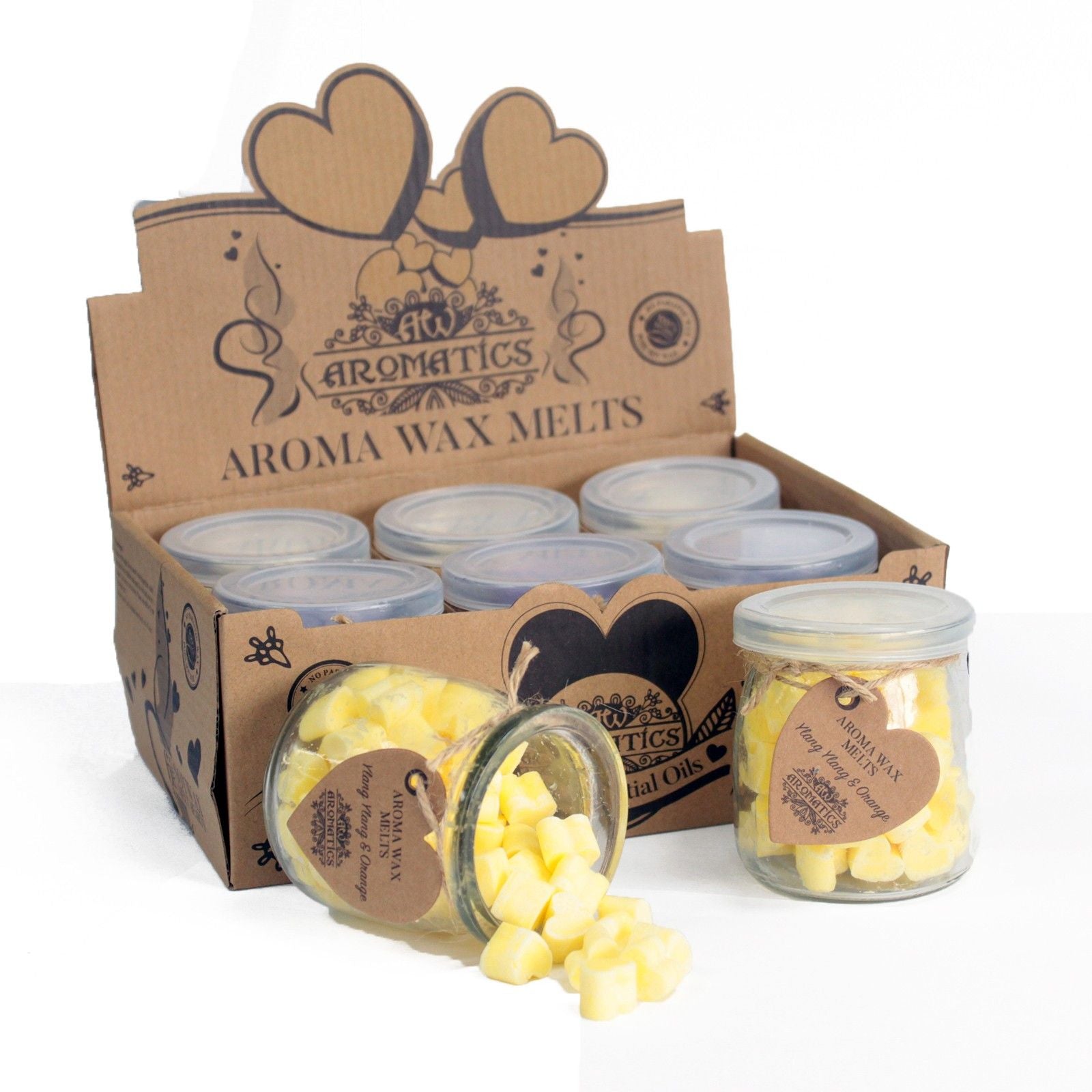 Ylang ylang and orange aroma wax melts in glass jar with soy wax hearts