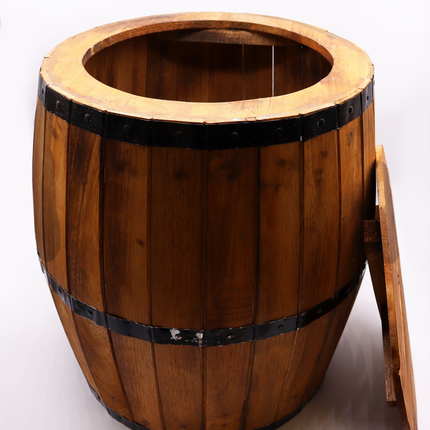 Natural wood beer barrel table with round top and dark metal-style bands