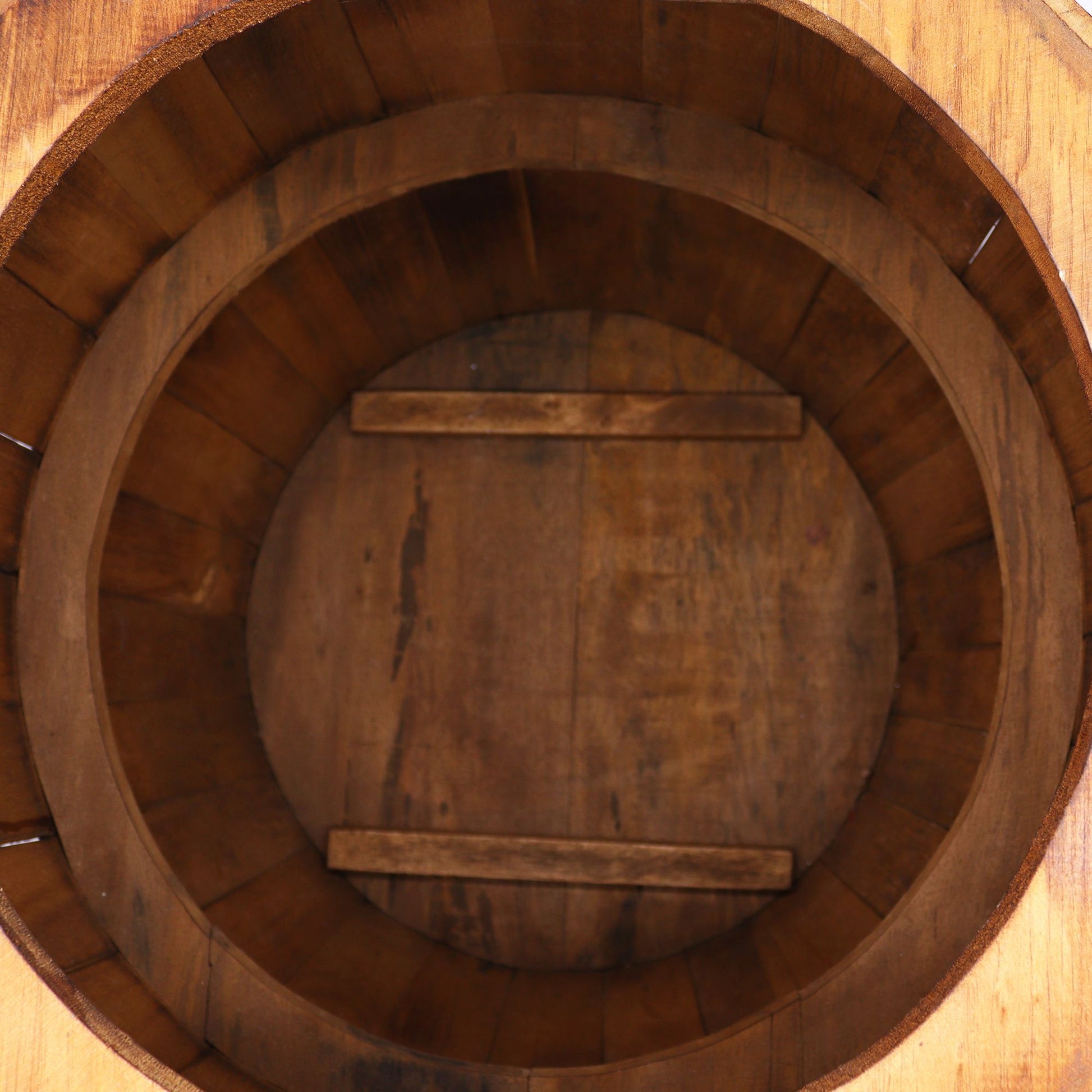 Natural wood beer barrel table with round top and dark metal-style bands