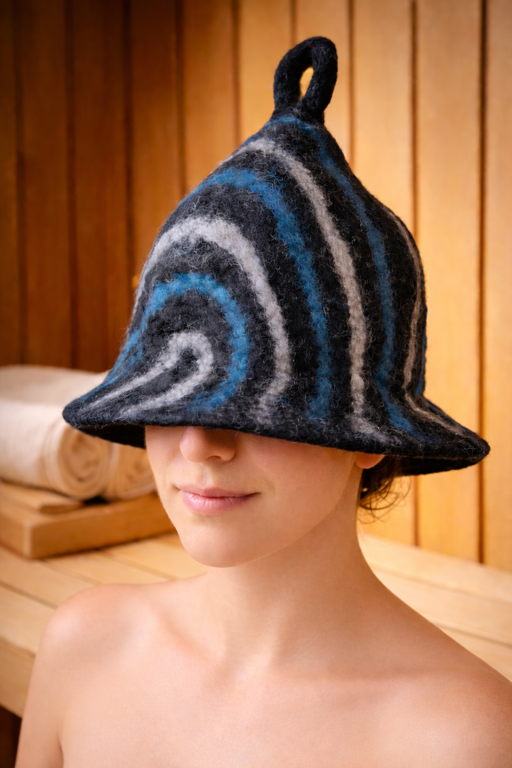 Natural felt sauna hat in black with blue and grey decorative stripes | WoodenLandia