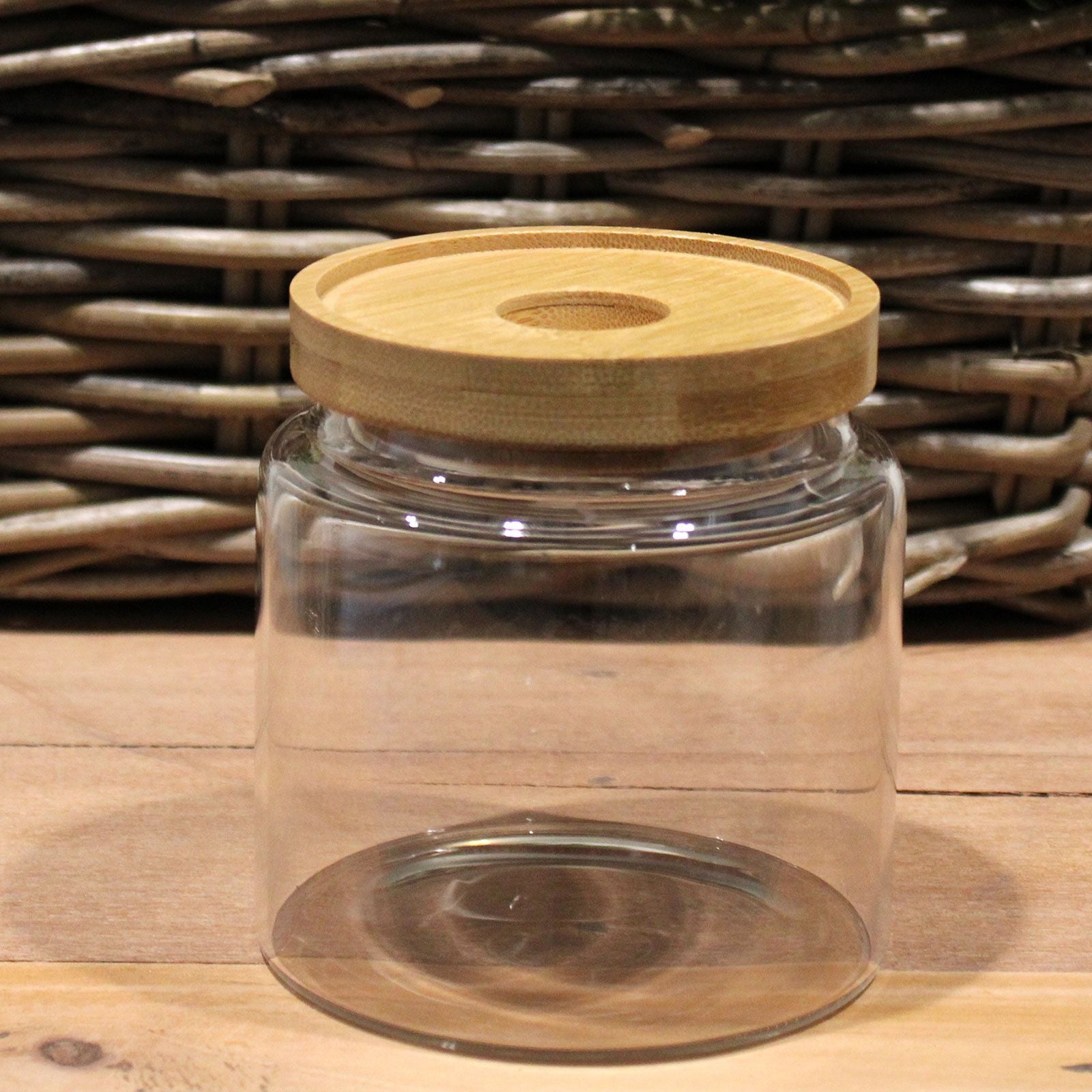 Clear glass storage jar with a bamboo lid | WoodenLandia