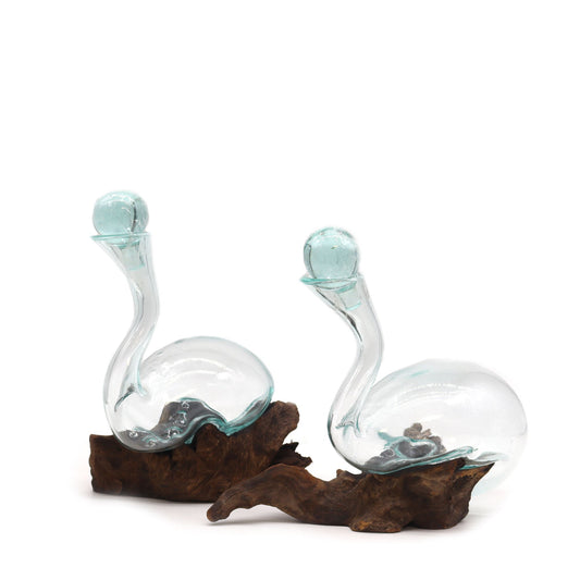 Handcrafted glass swan sculptures mounted on natural wood bases | WoodenLandia