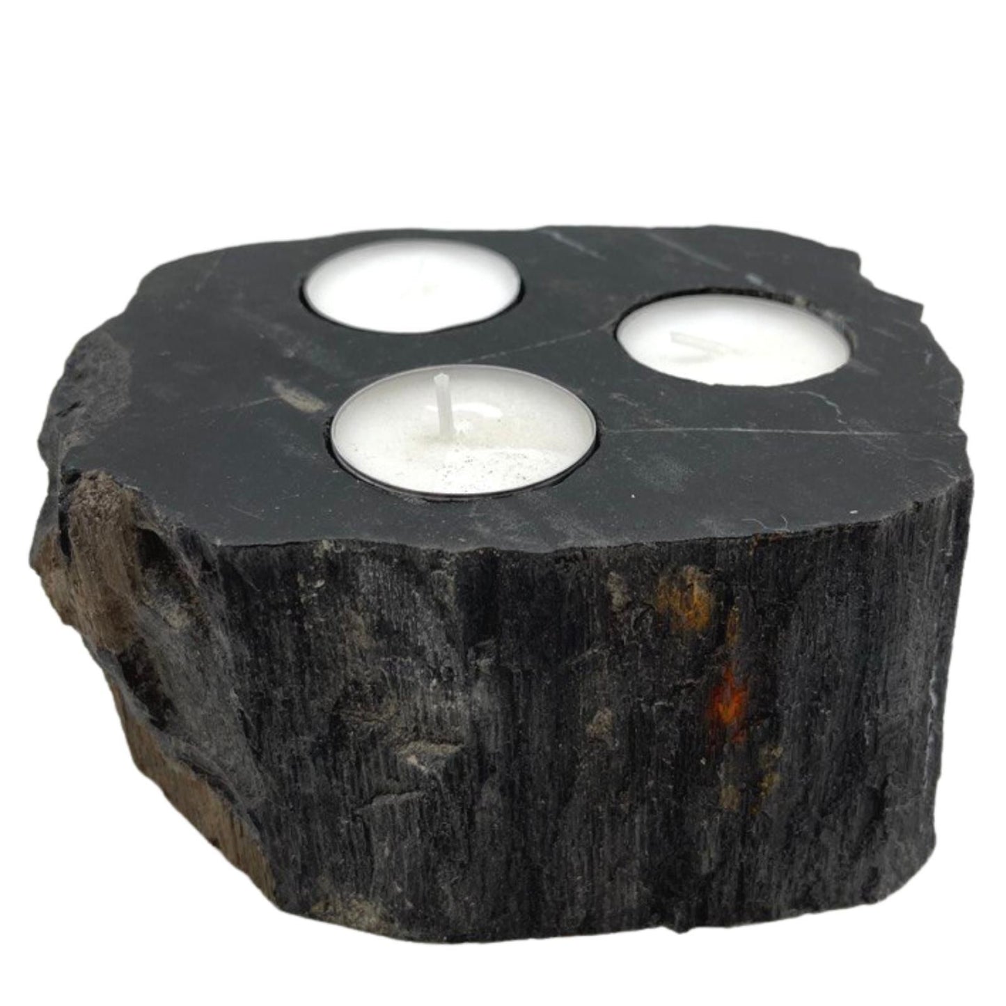 Triple petrified wood candle holder with three tealight candles