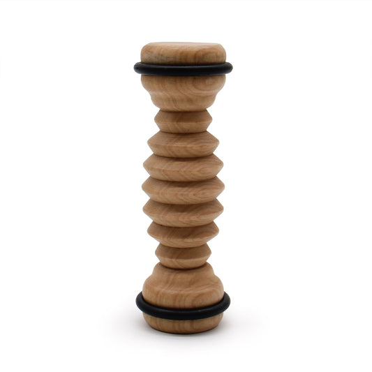 Ribbed wooden foot roller with black rings side view