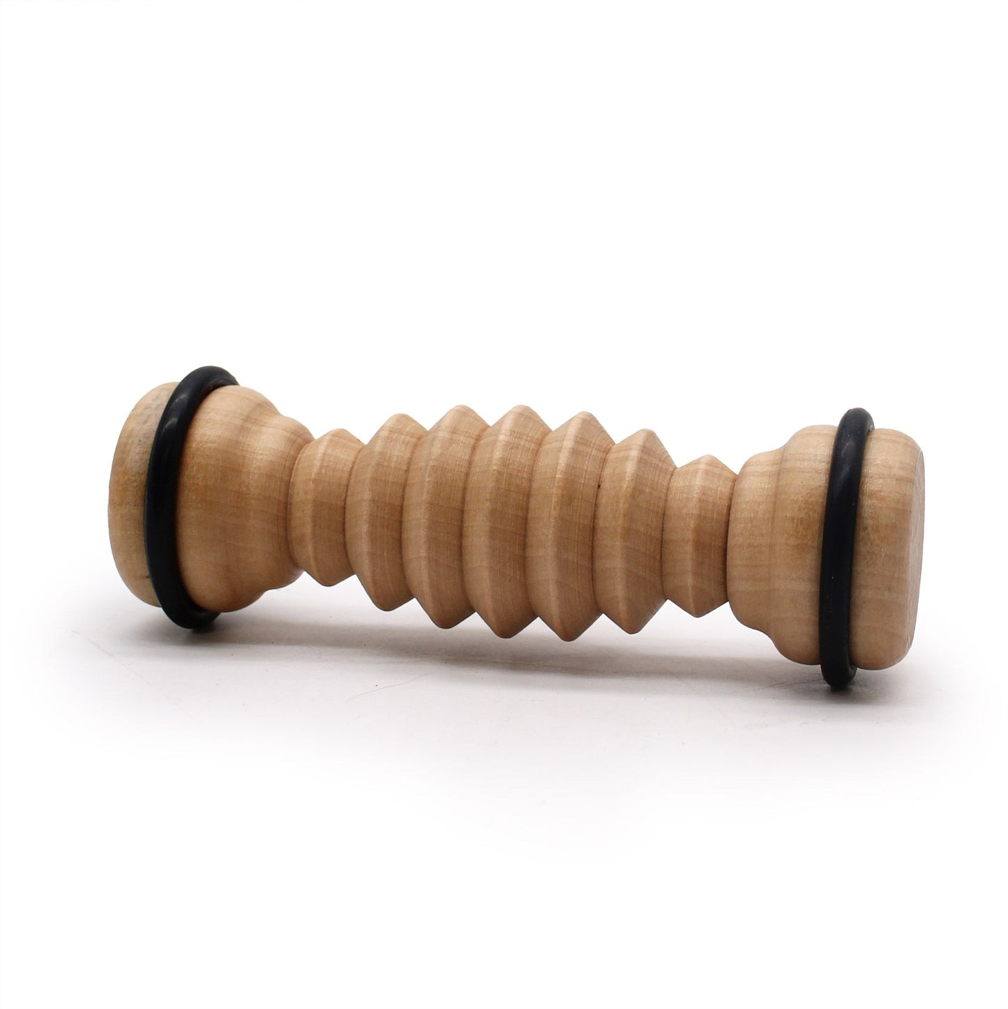 Ribbed wooden foot roller with black rings side view