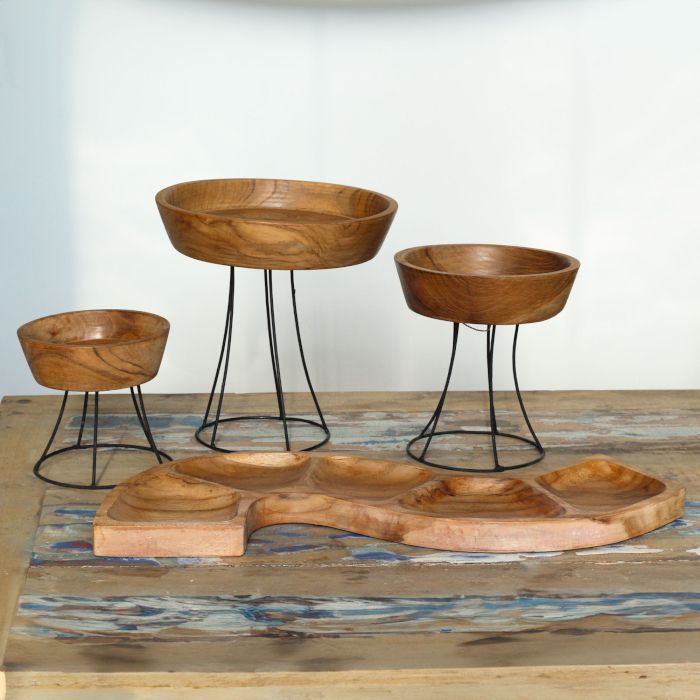Set of three elevated teak wood bowls on black metal stands | 