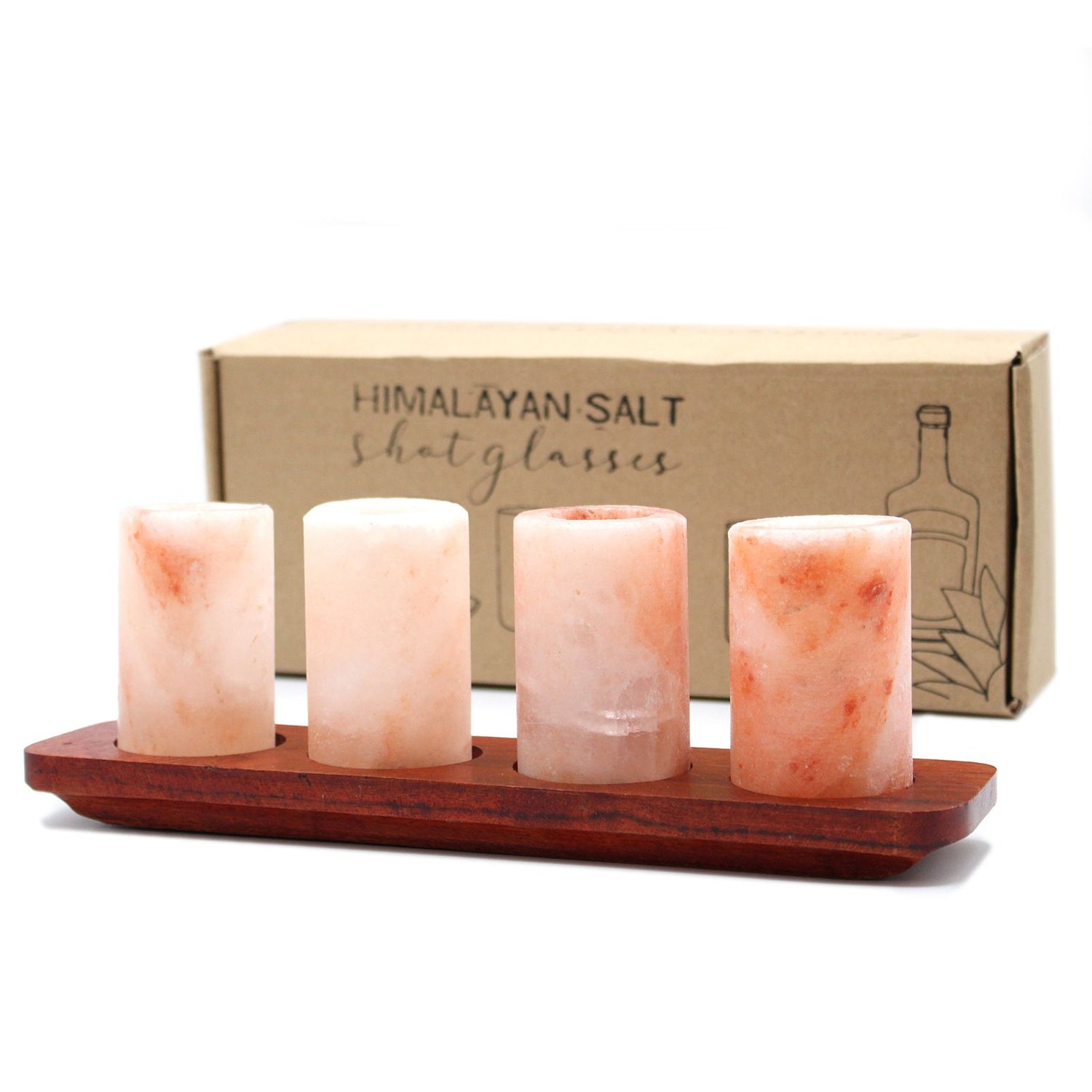 Four Himalayan salt shot glasses on a wooden serving stand with gift box